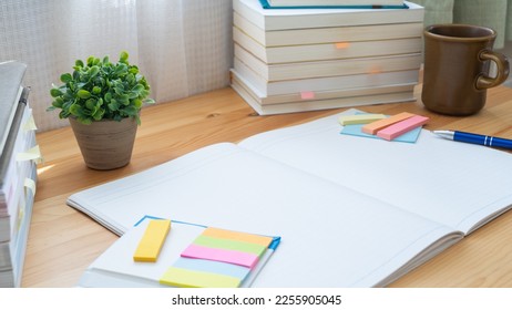 Open notebook and textbook. image of study. - Shutterstock ID 2255905045
