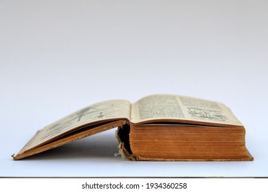 Open Old Book With Text On White Background