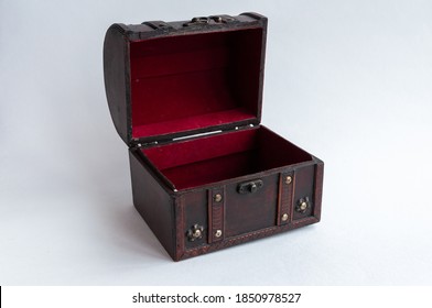 open old decoration chest on light background, side top angle
