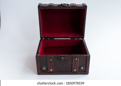 open old decoration chest on light background, front top angle