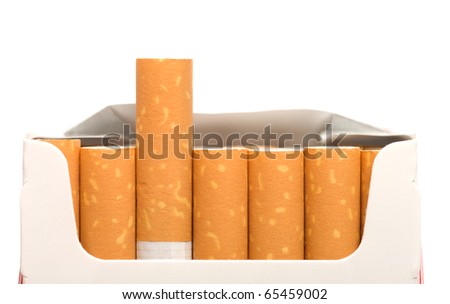 Open a pack of filtered cigarettes closeup isolated on a white background.