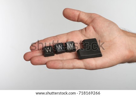 Open palm with three computer buttons with word WWW and Enter