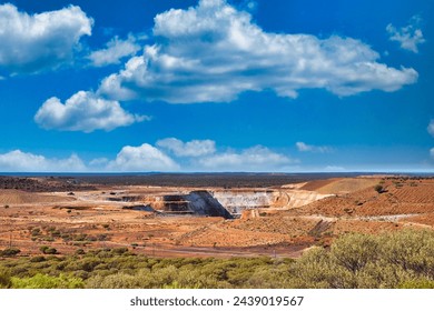 Open pit gold mine in the vast expanse of the Western Australian outback, close to the town of Mount Magnet
 - Powered by Shutterstock