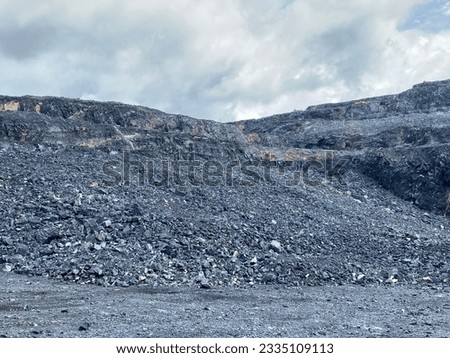 Open pit limestone mining, quarry for cement plant.