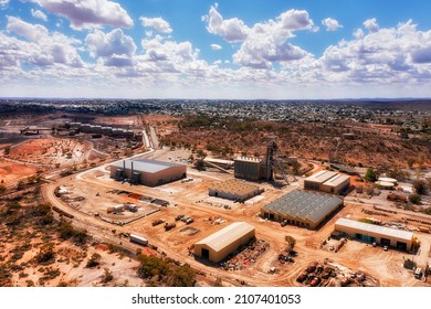 Open pit minerals and metal ore Junction Mine in Broken hill silver city - elevater aerial cityscape.