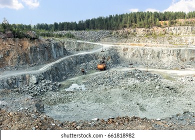 Open pit mining and processing plant for crushed stone