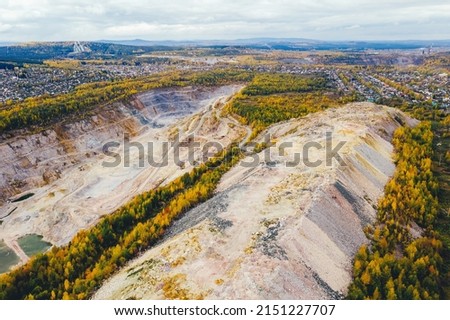 Open pit mining and processing plant for crushed stone