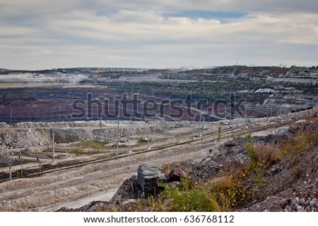 Open pit of the Stoilensky Mining and Processing Plant and railway