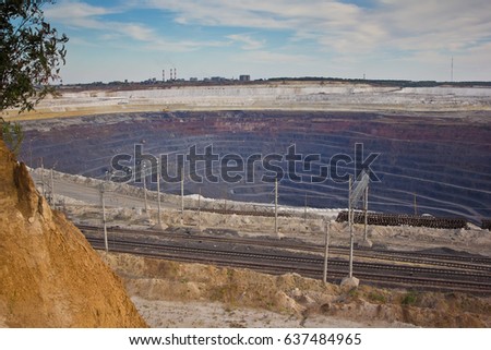 Open pit of the Stoilensky Mining and Processing Plant and railway