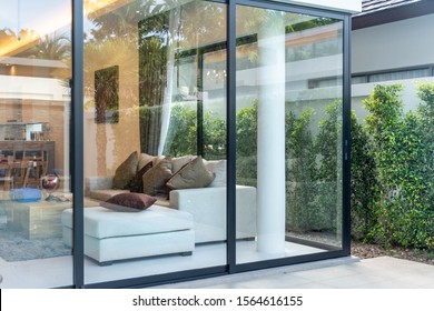 open plan living area with sliding door and garden
