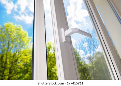 Open Plastic Vinyl Window On A Background Blue Sky