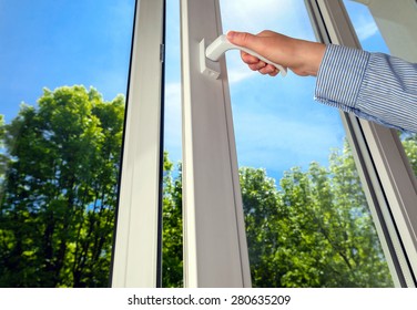 Open Plastic Vinyl Window On A Background Blue Sky