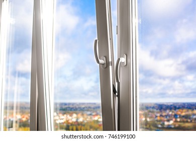 Open Plastic Vinyl Window On A Background Blue Sky