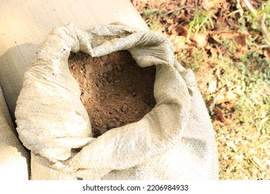 Open Polypropylene Bag With Cow Manure Humus, Crumbly Structure, Light. Organic Fertilizer To Improve Soil Fertility, Enriched And Nutritious Soil For Plants.