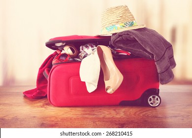 Open Red Suitcase And Floor With Window 