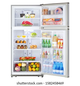 Open Refrigerator With Food Isolated On White. Front View Of Stainless Steel Top Mount Fridge Freezer. Electric Kitchen And  Domestic Major Appliances. Two Door Top-Freezer Fridge Freezer