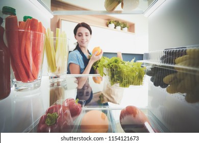 Open refrigerator with fresh fruits and vegetable. Open refrigerator - Shutterstock ID 1154121673