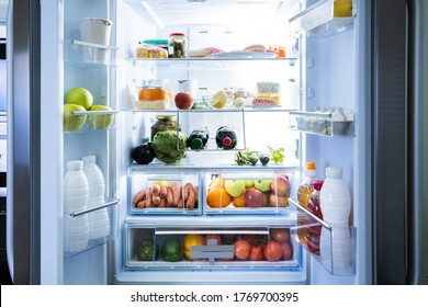 Open Refrigerator Or Fridge Door With Food Inside