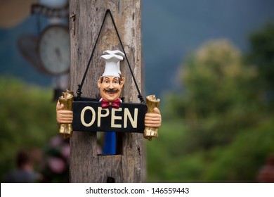 Open restaurant hanging sign - Powered by Shutterstock