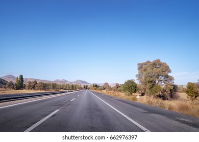 Open road! Landscape with empty road and mountains.