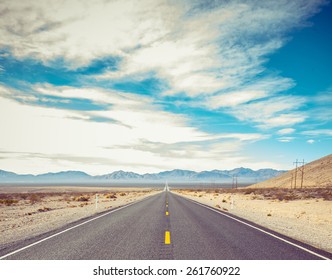 Open Road and possibilities. Road in Death Valley National Park. Artistic Instagram style processing. - Shutterstock ID 261760922