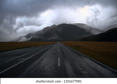 Open Road Towards The Stormy Mountains