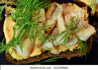 Open Rye Sandwich With Fried Perch Fish, Cream Cheese And Dill. Close Up Top View