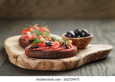 Open Rye Sandwich With Salami And Vegetables