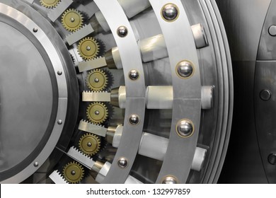 An open safe door in a vault - Shutterstock ID 132997859
