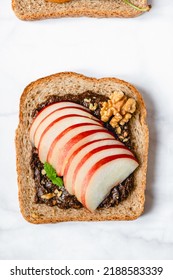 Open Sandwich With Sliced Peach Fruit And Walnut. Made From Wholegrain Bread Slice And Chocolate Crunchy Cashew Nut Butter, Healthy Nutritious Snack Option