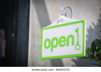 Open Sign Broad On The Glass Of Window At Shop