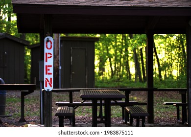 An OPEN Sign A A Concessions Dining Area At A Nature Park