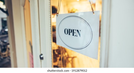 Open Sign Hanging On Store Front Stock Photo 1912879012 | Shutterstock