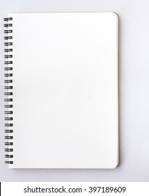 Open Small notepad on white background