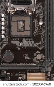 Open socket for processor on motherboard for office PC, close up view. 