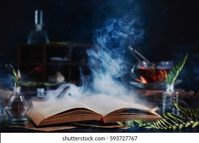 Open Spell Book With Magical Smoke