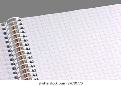 An Open Spiral Bound Notebook With Lined Paper