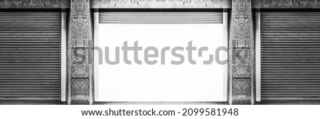 Open steel shutter door of warehouse, storage or storefront for metal door background and textured.