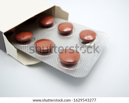 Open tablet pack with plastic blister of iron tablets, ferrum capsules      