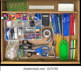 Open Teacher's Desk Drawer Full Of Supplies.