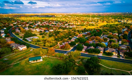 open Texas land for sale expanding housing development fall Autumn suburb suburbia round Rock Texas colorful landscape trees changing colors fall in central texas