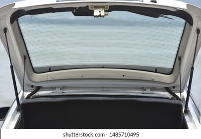 An Open Trunk Of A Private Car