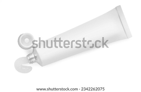 Open tube of ointment isolated on white, top view. Space for text
