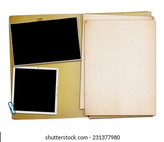 Open vintage folder with two old photographs, isolated, clipping path.
