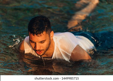 Open Water Swimming. Male Athlete Swimming In Lake. Triathlon Long Distance Swimming