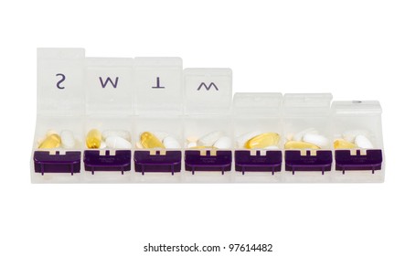 Open Weekly Pill Organizer Filled With Pills