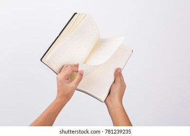 Open White Book - A Hand Flipping Pages