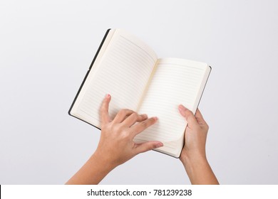 Open White Book - A Hand Flipping Pages