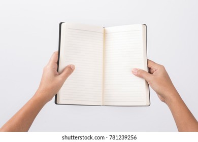 Open White Book - A Hand Flipping Pages