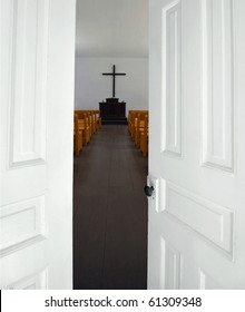 open white doors on church